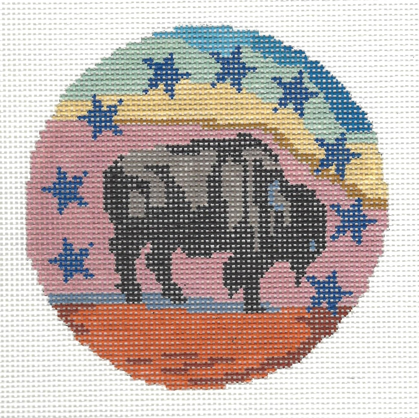Gingham Stitchery circular needlepoint canvas of a buffalo with stars around it and a multicolor background