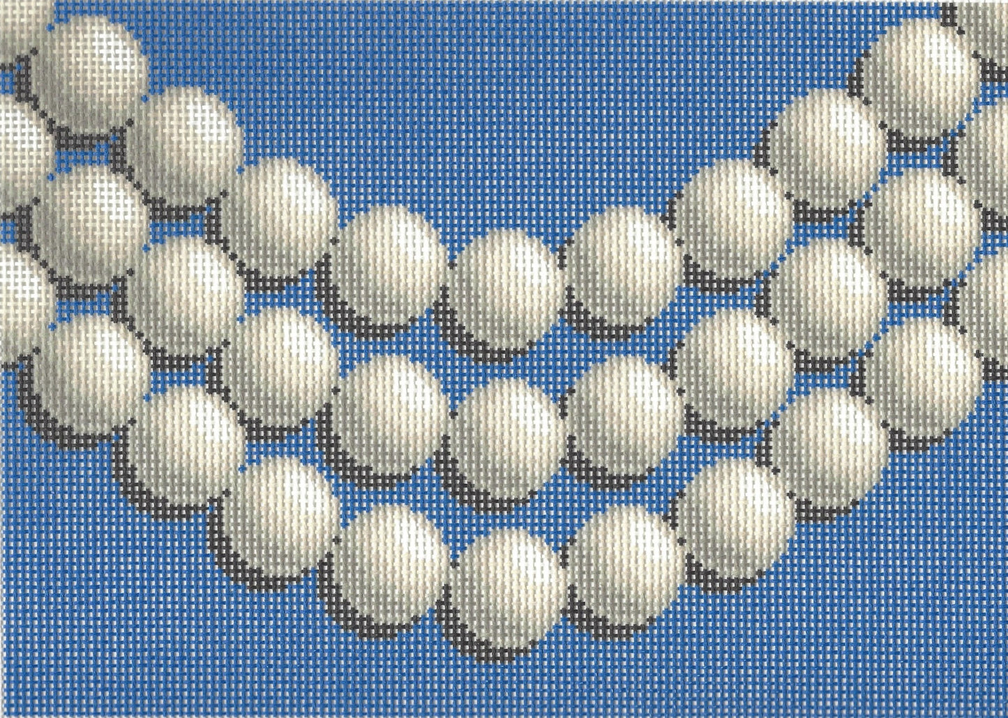 Jeni Sandberg needlepoint canvas of clutch with pearls and blue background