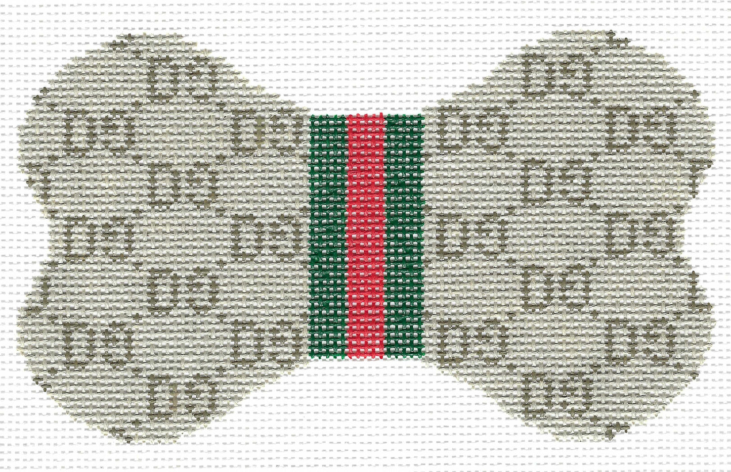 Lauren Bloch dog bone-shaped needlepoint canvas featuring a GG monogram pattern in beige and brown on a white background, with a central green and red web stripe.