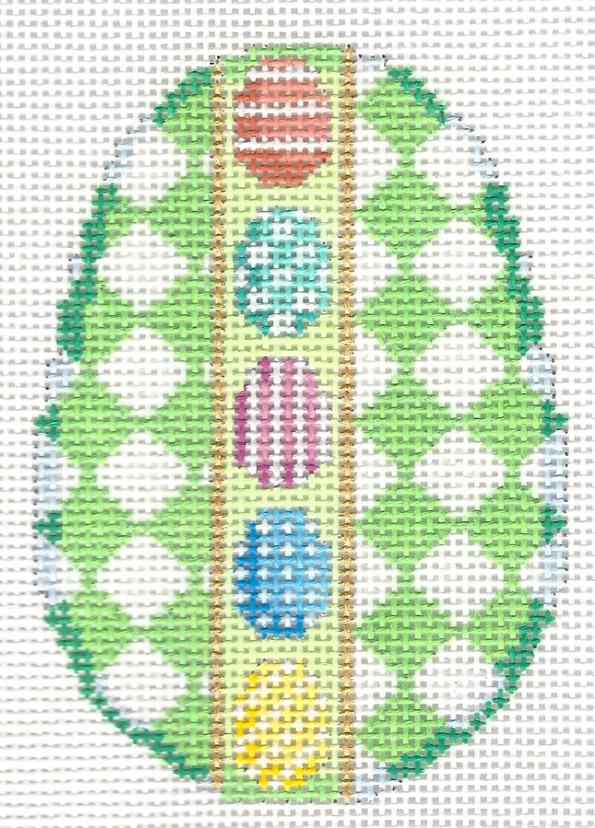 Associated Talents needlepoint canvas of colorful egg that contains green harlequin designs on each side and egg "dots" down the center