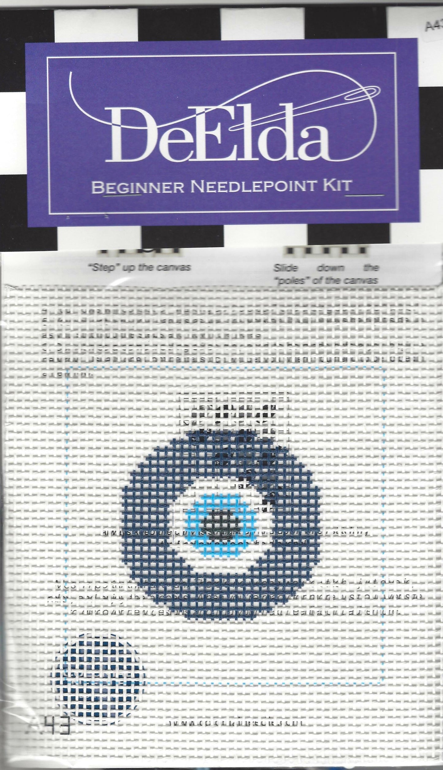 DeElda beginner needlepoint kit with an evil eye design