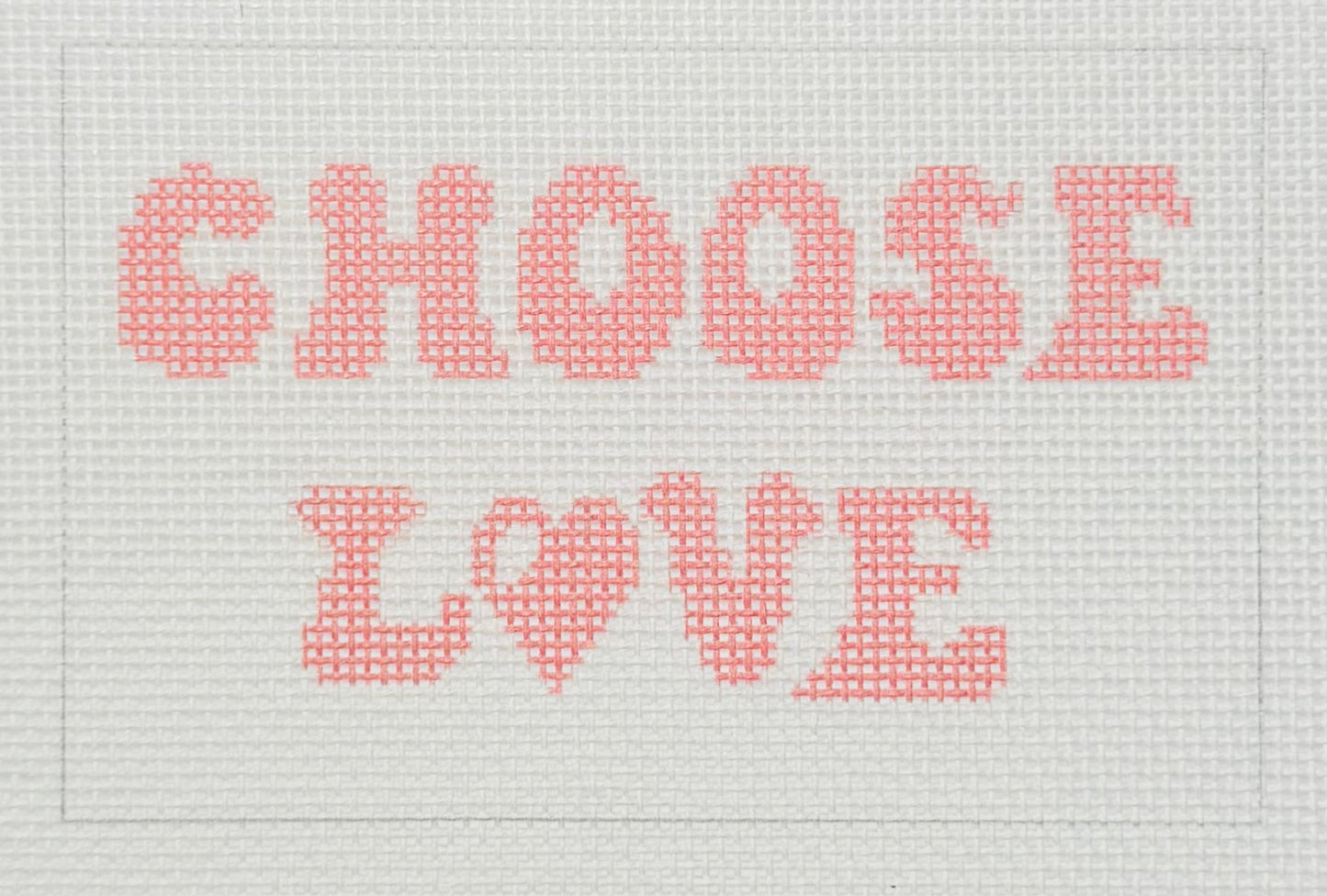 Tilli Tomas Planet Earth needlepoint canvas of text 'CHOOSE LOVE' in pink on a white background