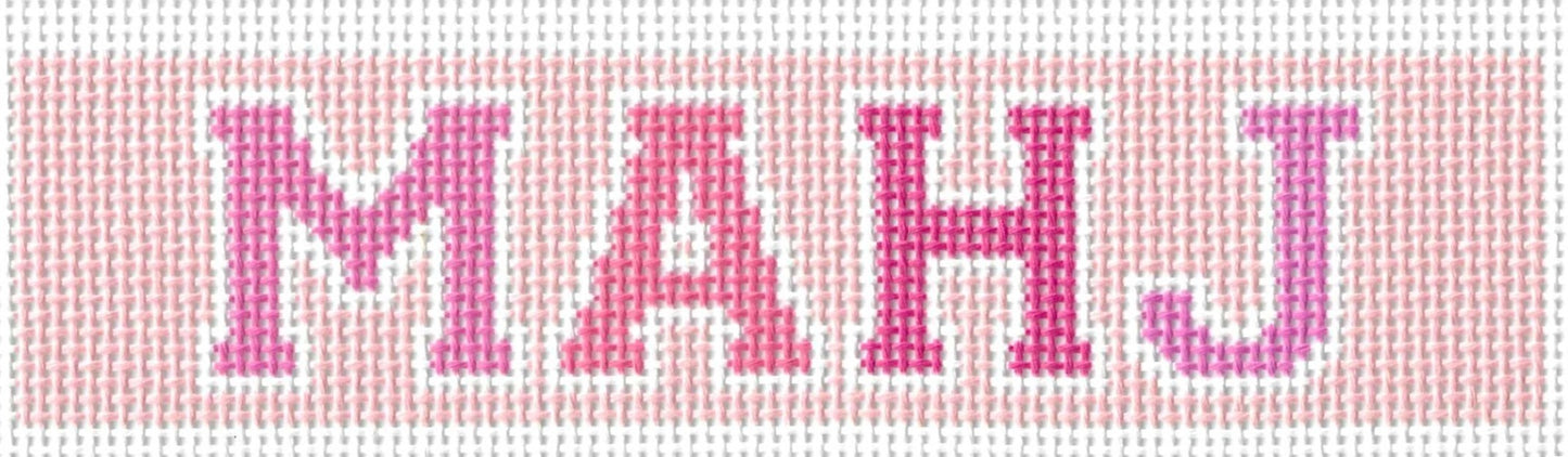 Rachel Barri Designs needlepoint canvas of text 'MAHJ' in pink on a white background