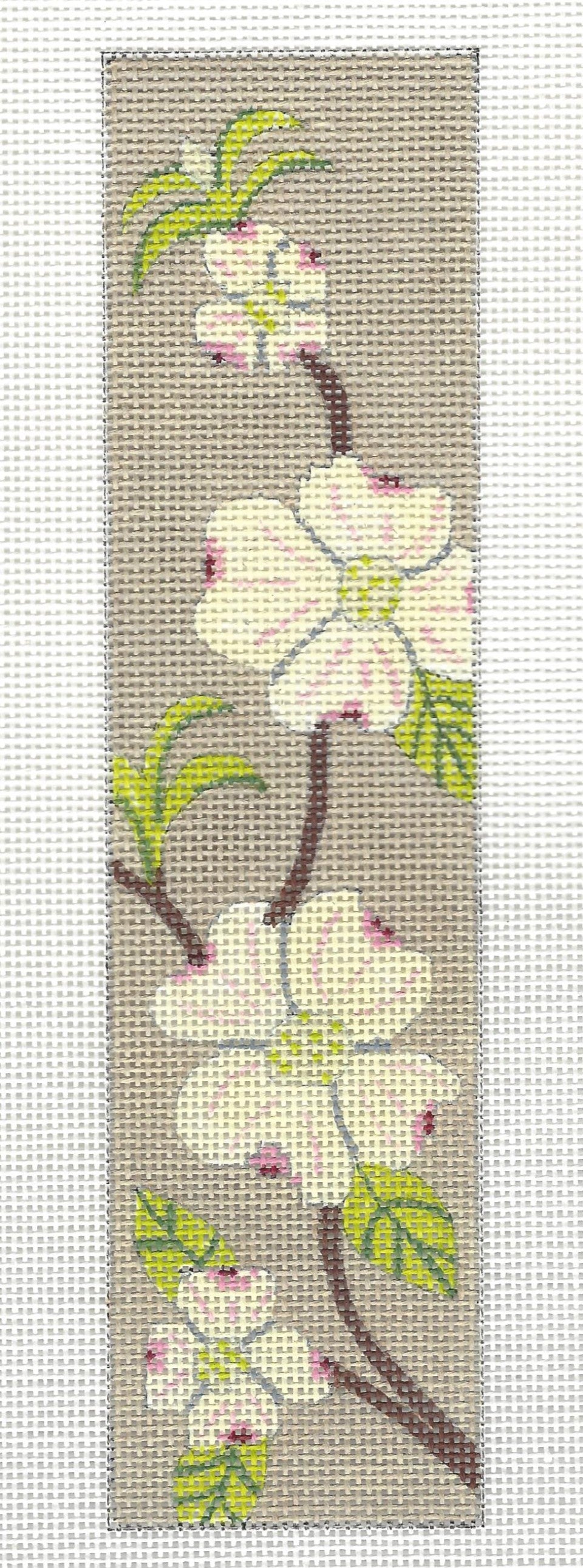 j. childs bookmark needlepoint canvas of floral dogwood design on a beige background