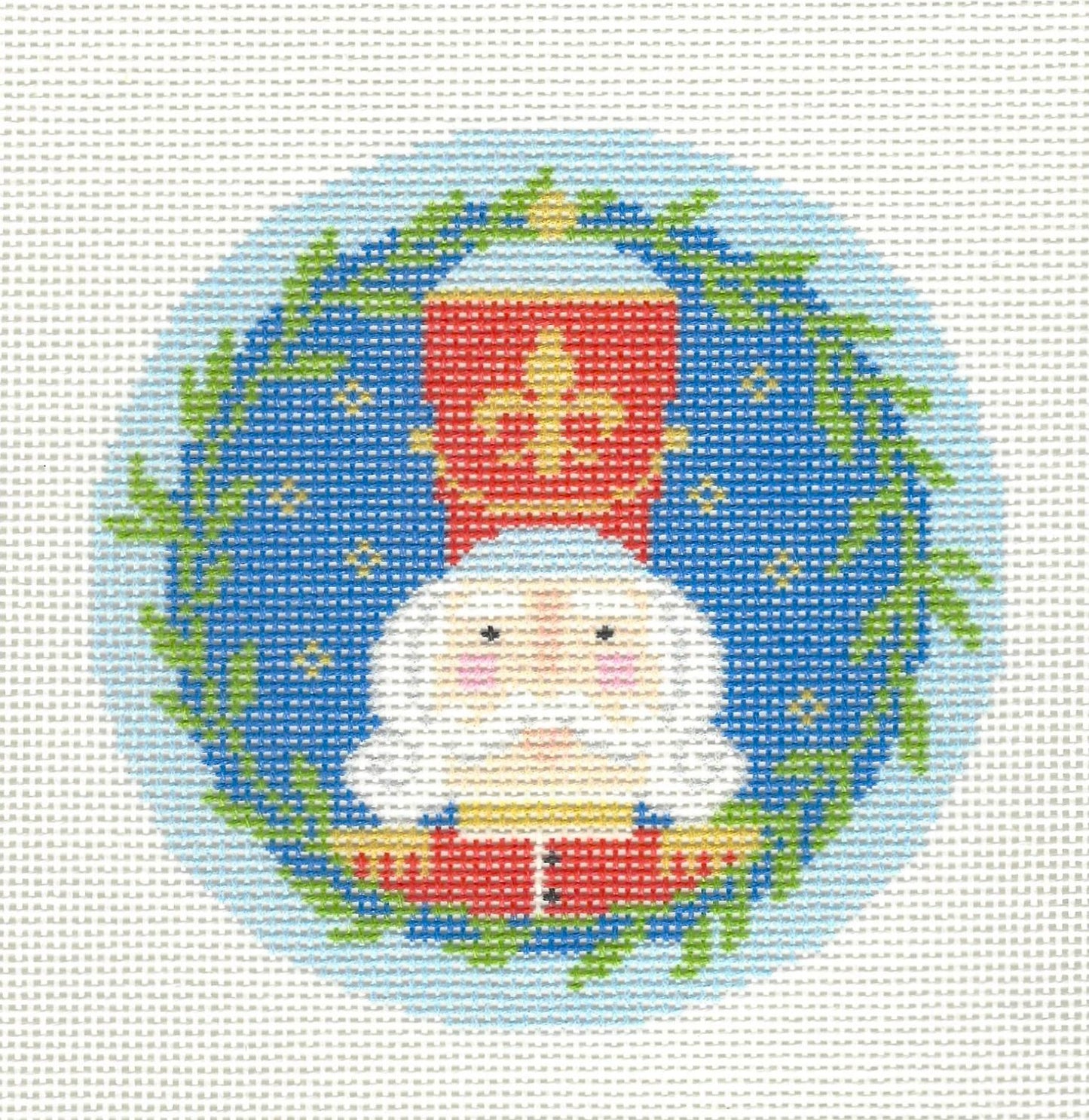 Kirk & Bradley round needlepoint canvas of a nutcracker - franz