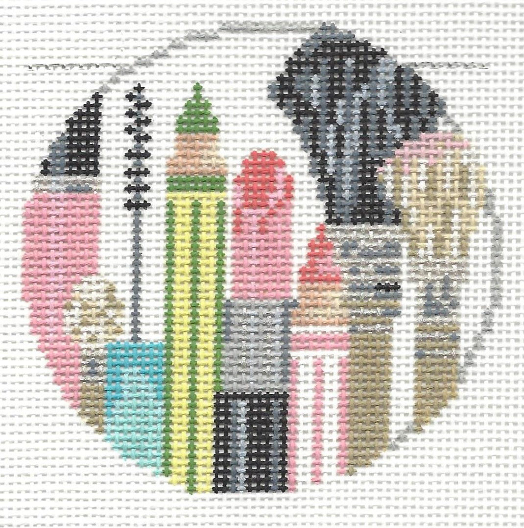 Kelly Clark round needlepoint canvas of colorful makeup tools with fuchsia and verde palette