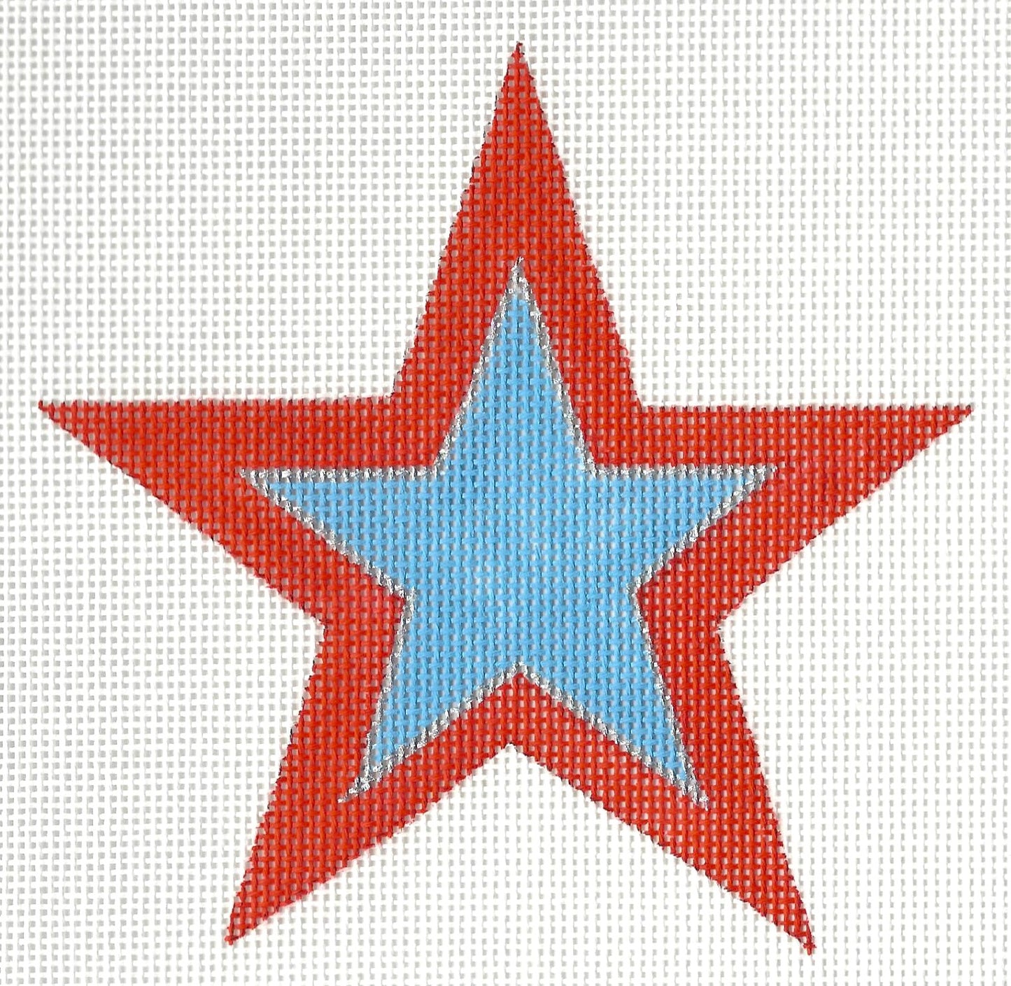 Raymond Crawford Designs needlepoint canvas of red star with a blue center