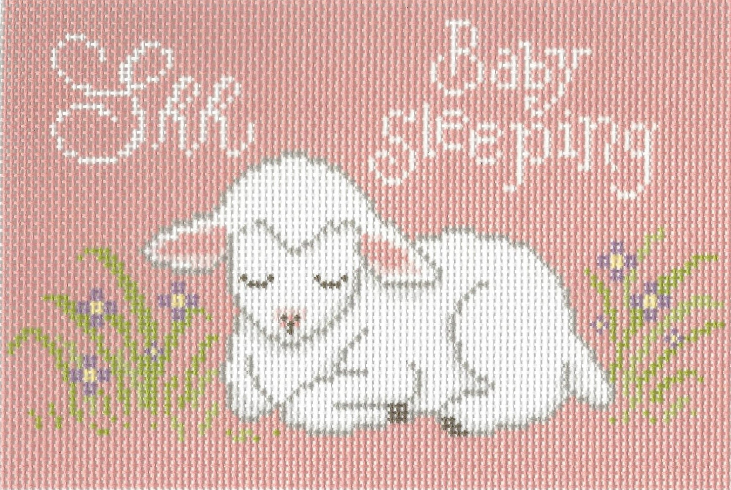 Needlepaint needlepoint canvas of a baby lamb with flowers on a pink background with text 'Shh Baby Sleeping'
