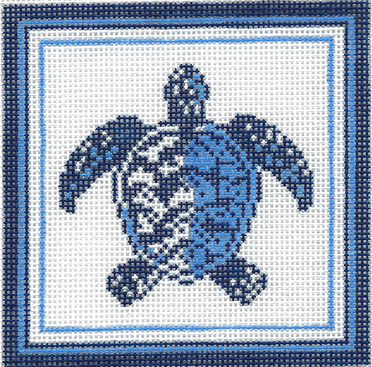 Kirk & Bradley square needlepoint canvas featuring a blue sea turtle design on a white background, framed by concentric light and dark blue borders.