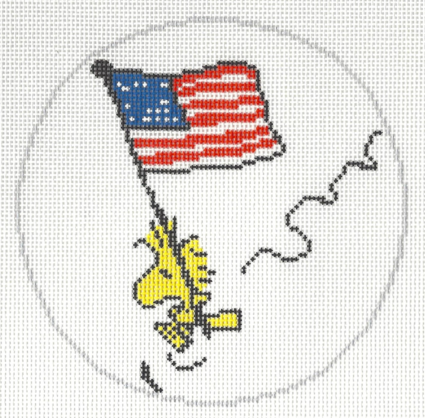 Officially Needlepoint canvas of Woodstock flying an American flag on a white background