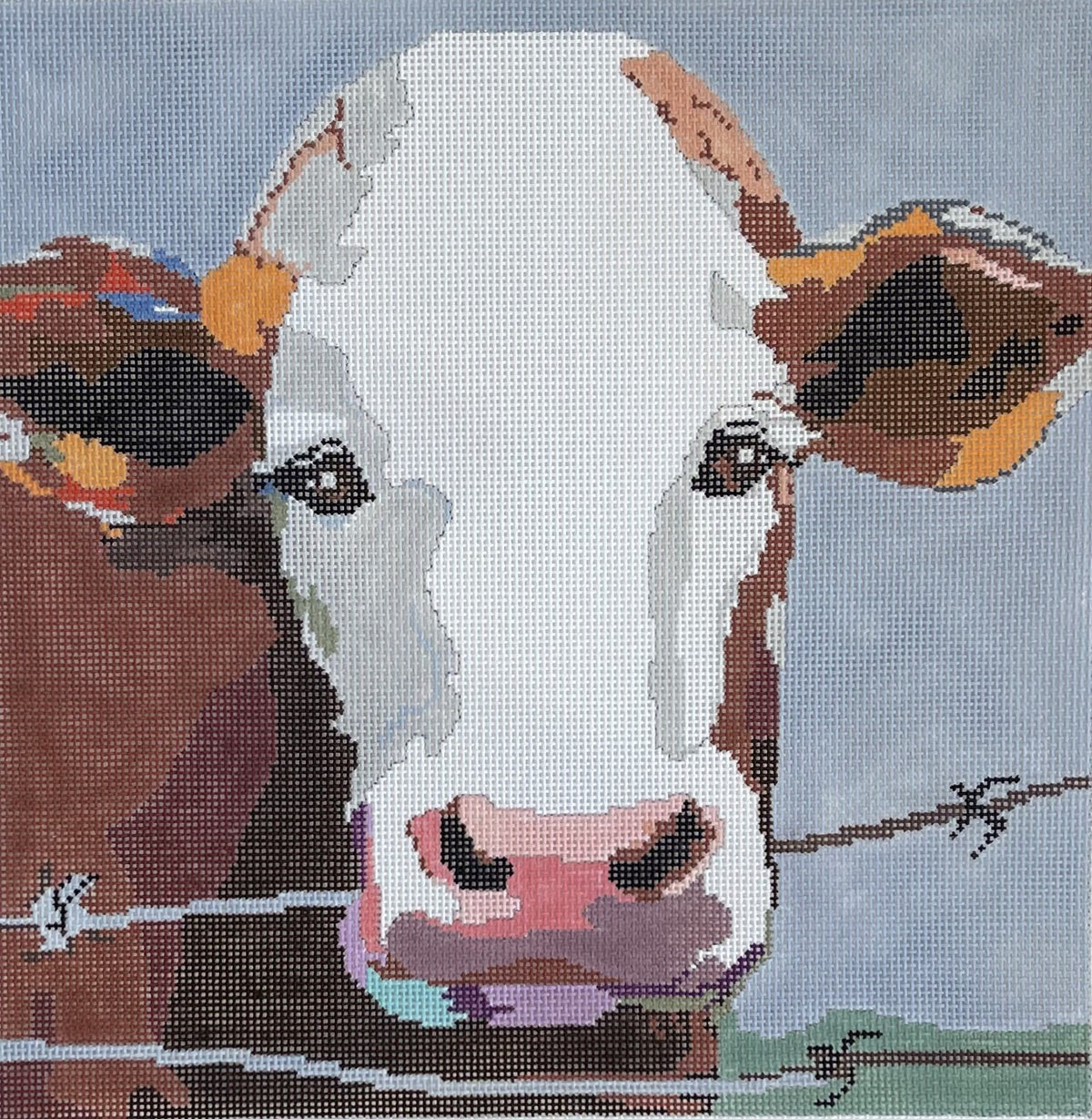 Birds of a Feather needlepoint canvas of a cow's face with a blue background