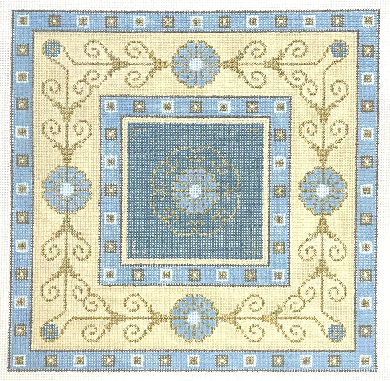JP Needlepoint needlepoint canvas of filigree pattern in light blue and light yellow colors.