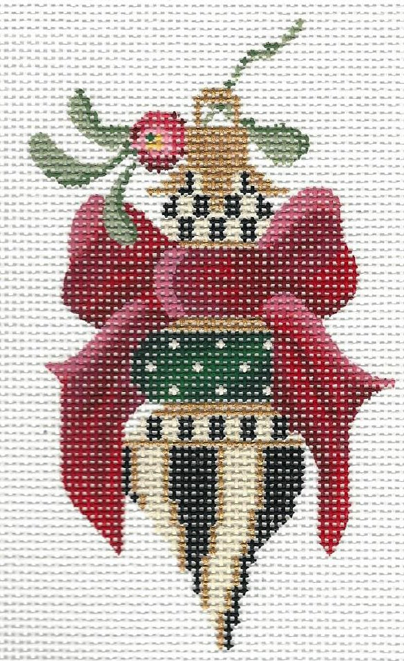 Kelly Clark needlepoint canvas of decorative ornament with a bow on a white background.