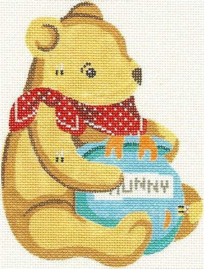 Silver Needle ornament needlepoint canvas of a bear with a red scarf holding a jar of honey with text 'Hunny'.
