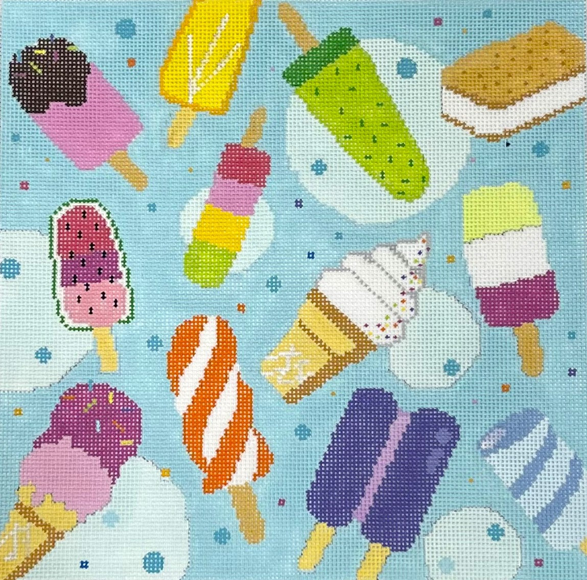 Blueberry Point Canvas needlepoint canvas of colorful ice cream cones and popsicles on a blue background.