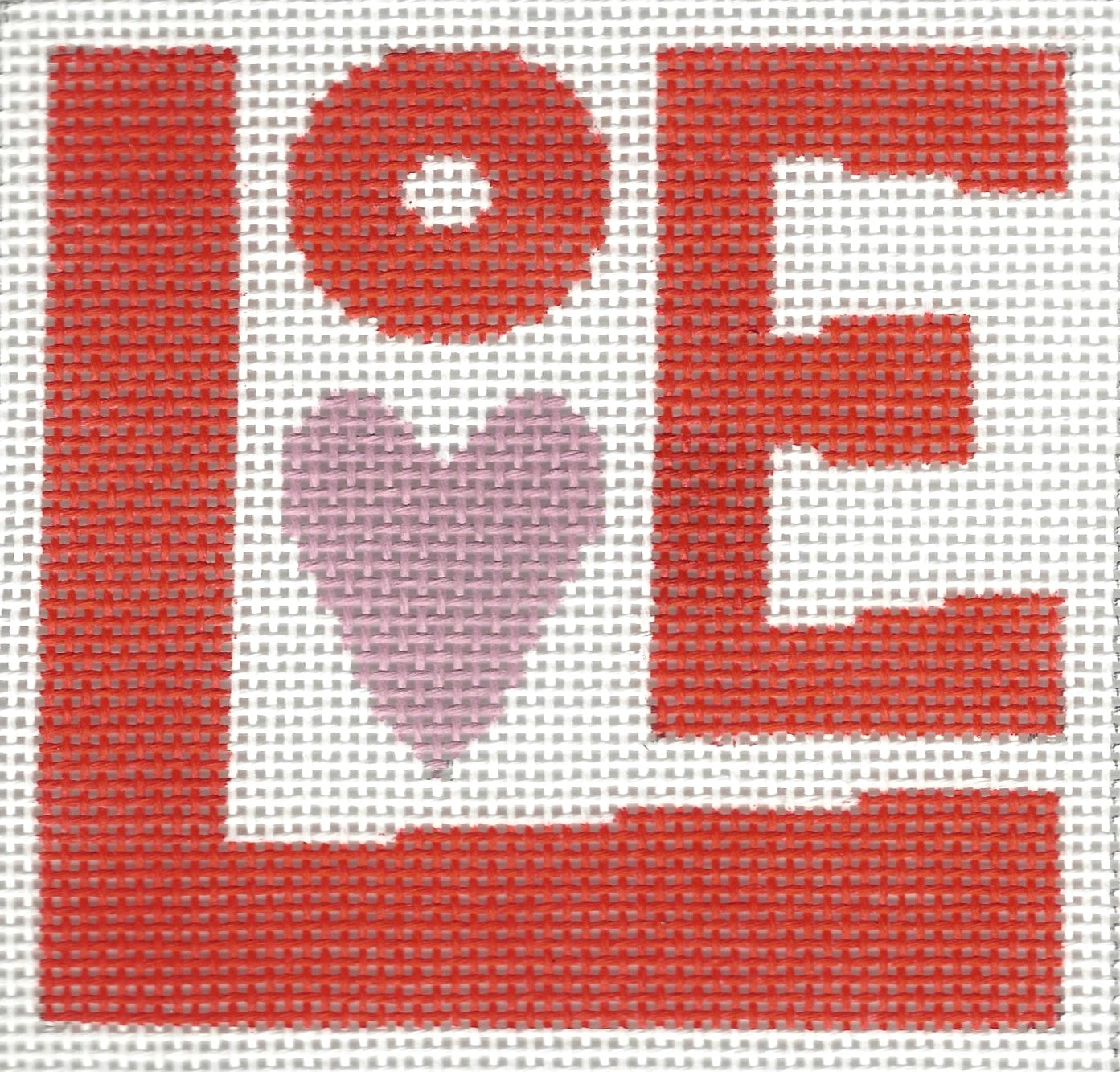 Stitch-Its needlepoint canvas with 'LOVE' in red and a pink heart on a white background.