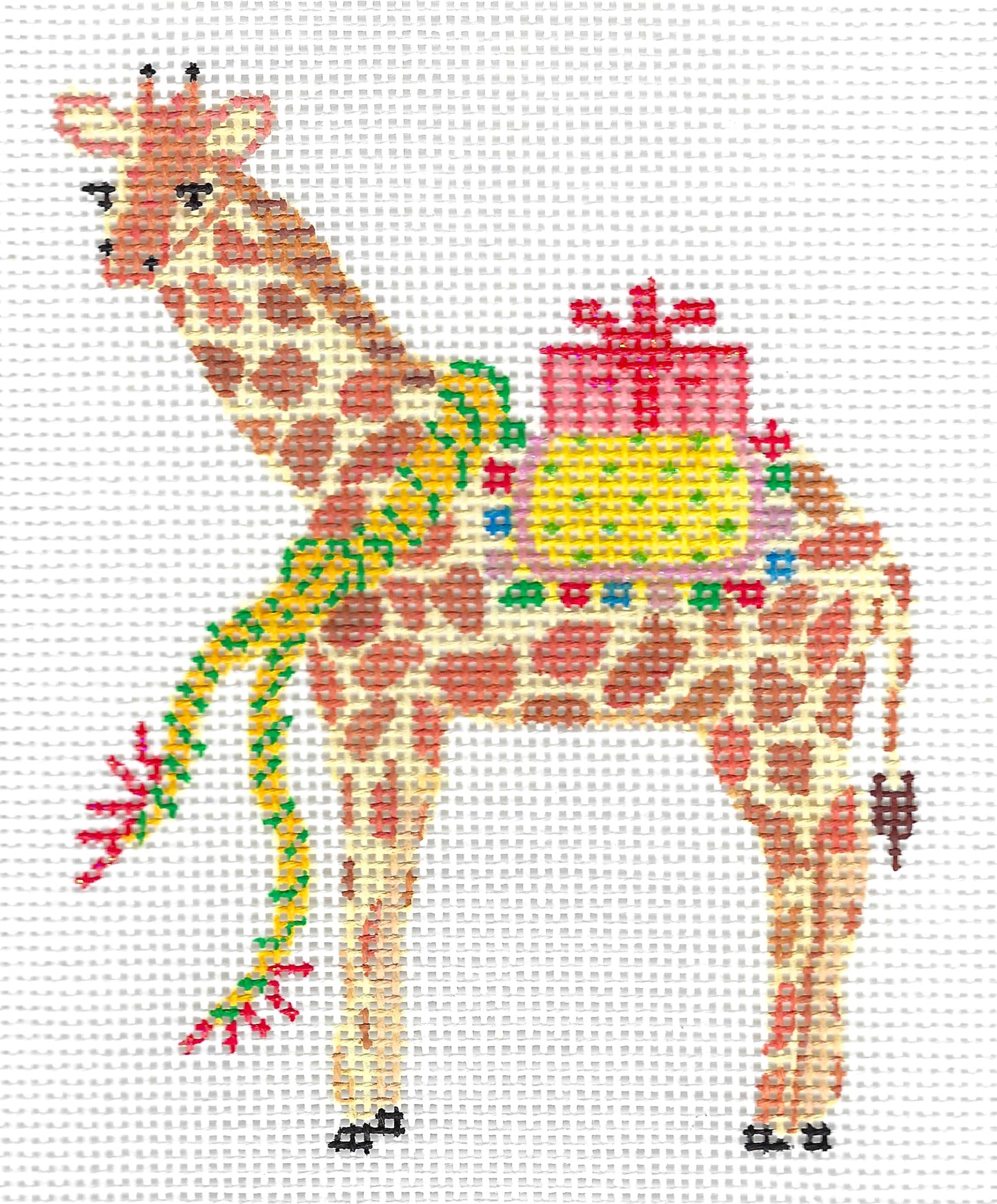 Kate Dickerson Needlepoint Collections needlepoint canvas of a giraffe with a colorful gift box and green garland, on a white background.