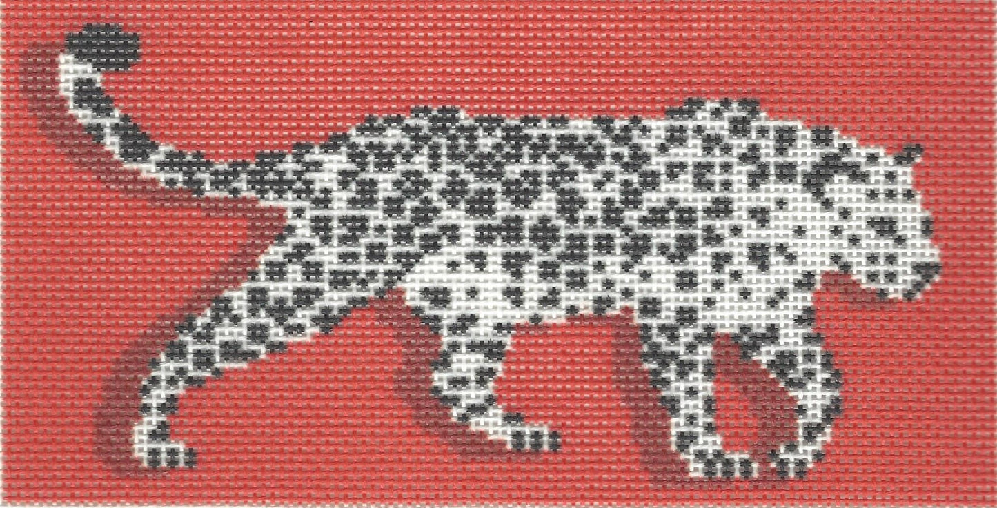 Needlepoint To Go needlepoint canvas of a leopard on a red background.