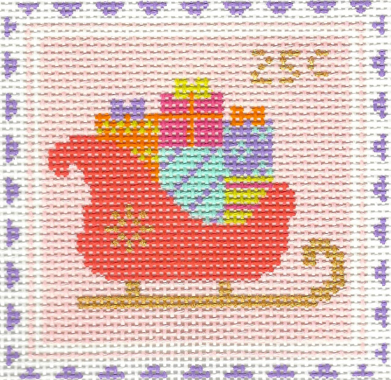 Stitch Rock needlepoint canvas of a red sleigh with colorful presents on a light pink background.