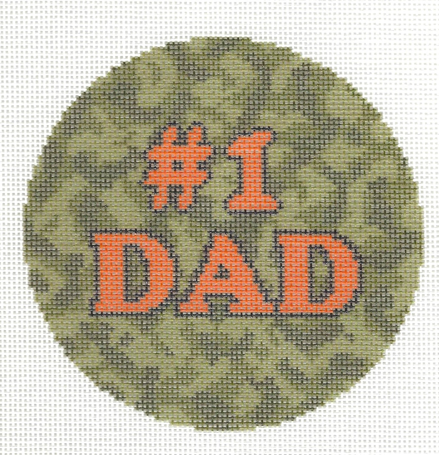 Needlepaint round needlepoint canvas with '#1 DAD' orange text on a camouflage background
