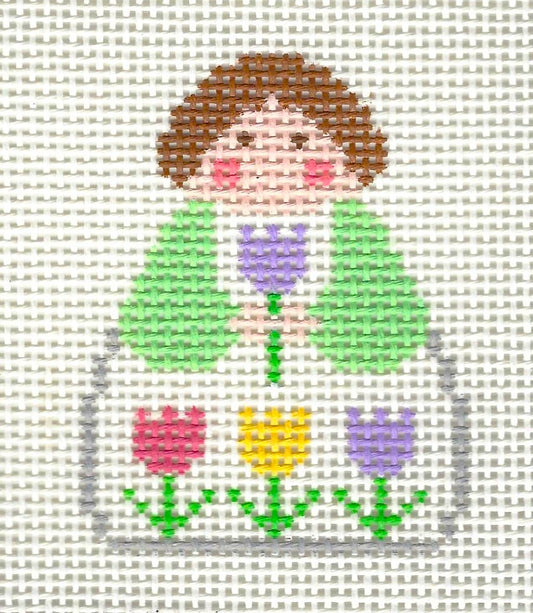 KCN Designers needlepoint canvas of a April angel with multicolored tulips