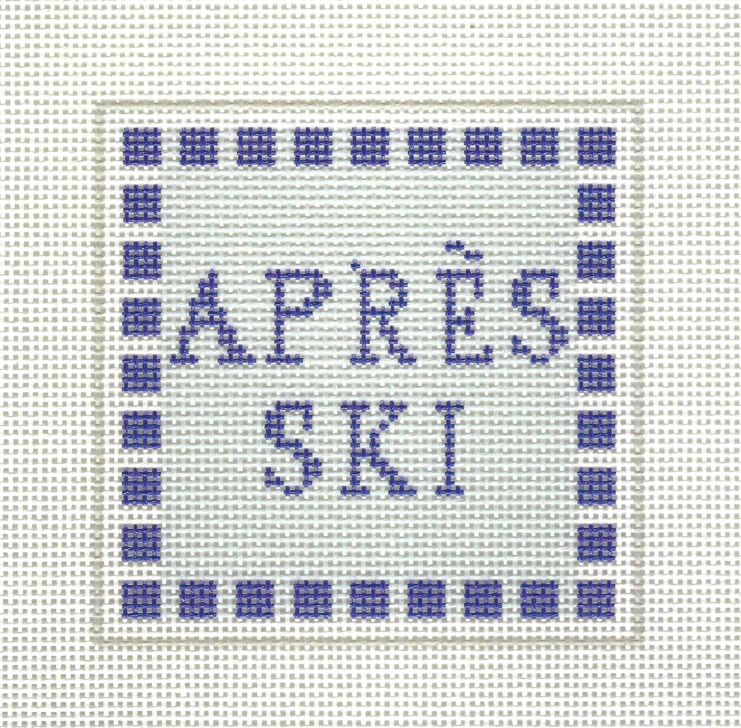 KCN Designers needlepoint canvas of 'APRèS SKI' text on a white background with checkered blue border
