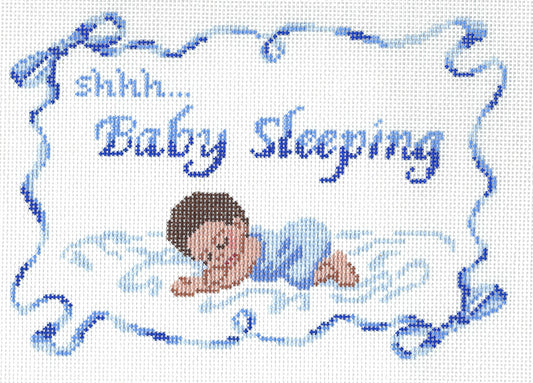 Spellbound Stitchery needlepoint canvas featuring a small baby boy sleeping with blue text 'shhh...Baby Sleeping" and a squiggly blue border with bows.