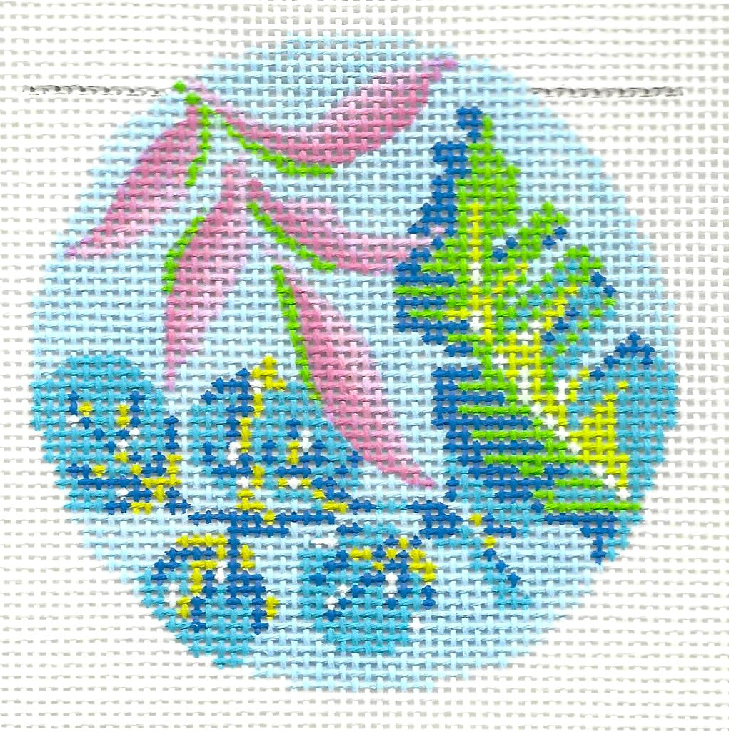 KCN Designers round needlepoint canvas of banana leaf with aqua and teal colors