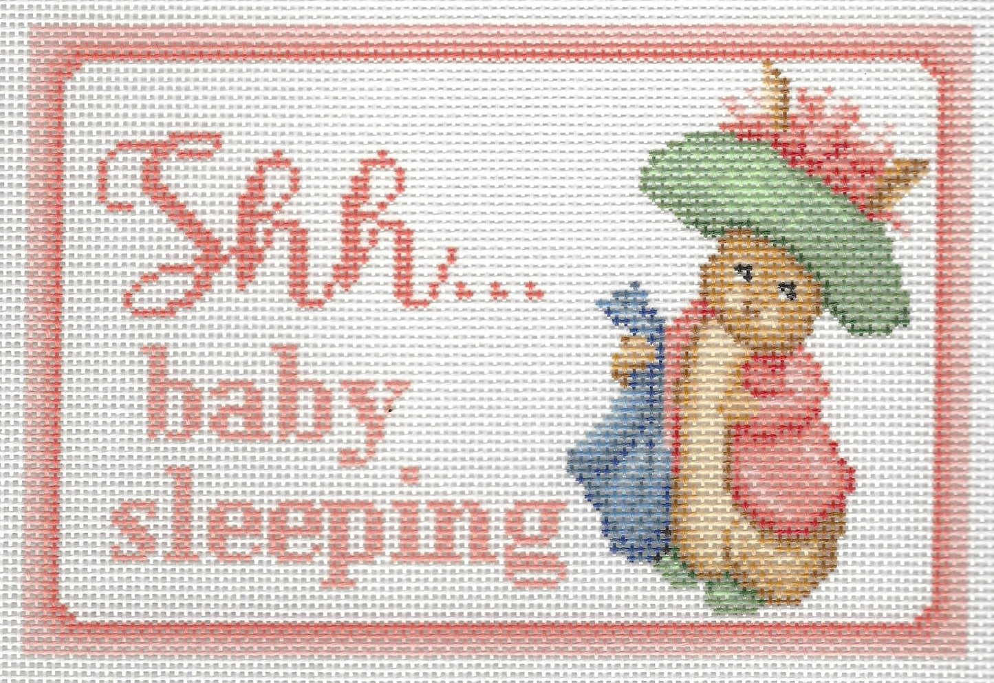 Needlepaint needlepoint canvas of Benjamin Bunny with 'Shh... baby sleeping' text on a white background with light pink border