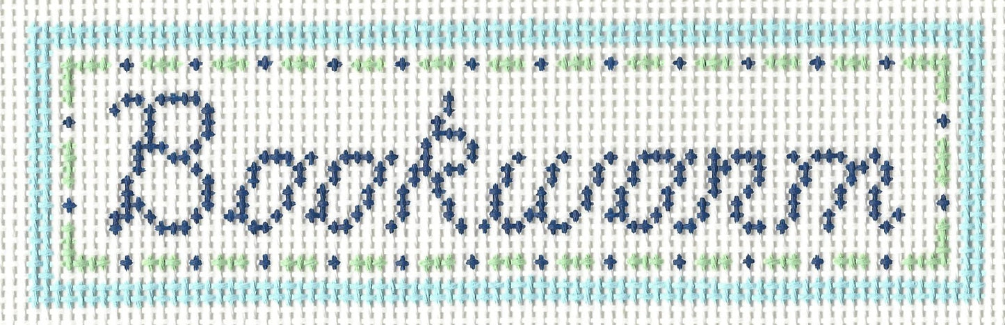 Stitchtent bookmark needlepoint canvas with text 'Bookworm'