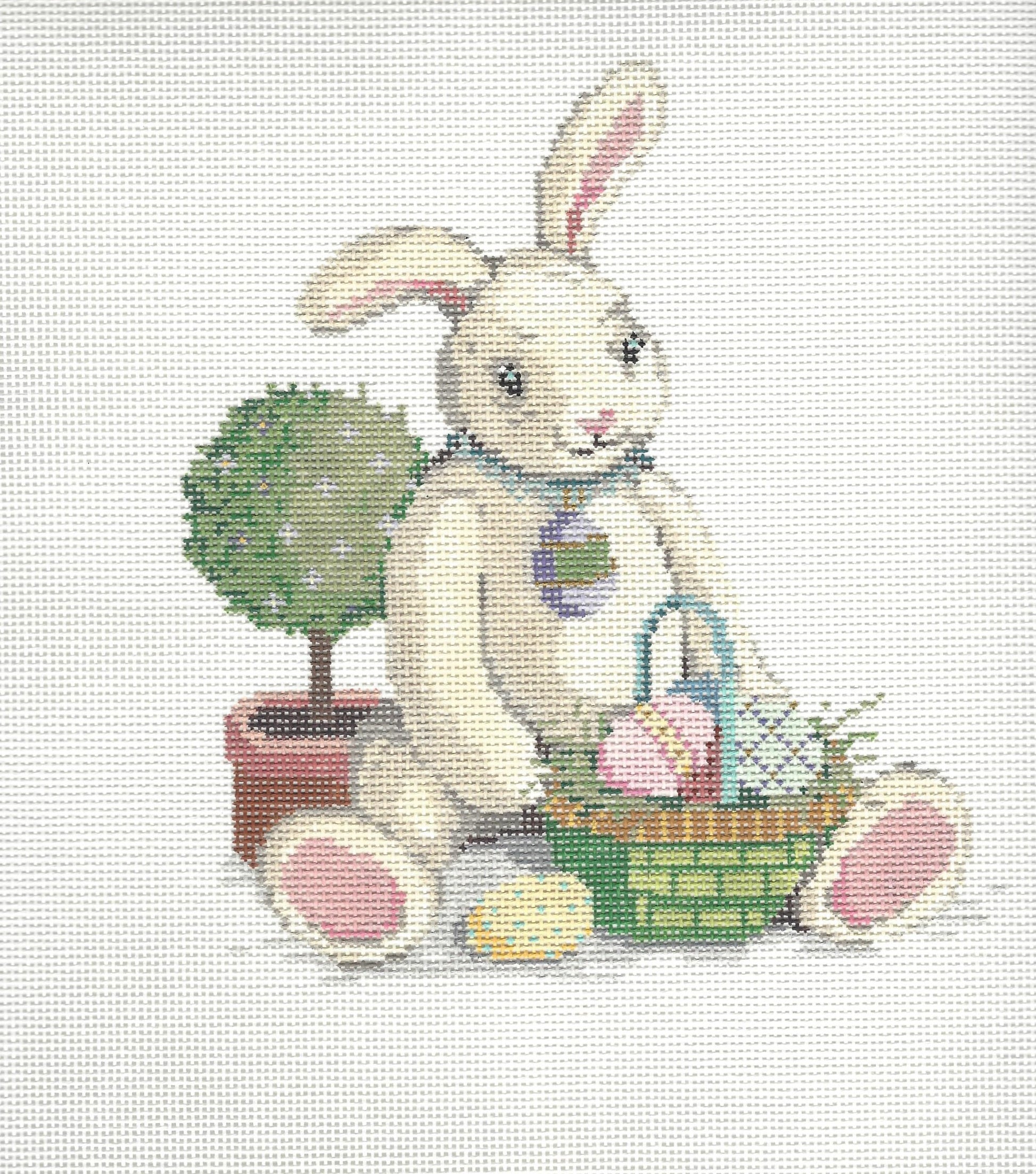 Sandra Gilmore needlepoint canvas of bunny with a basket of Easter eggs
