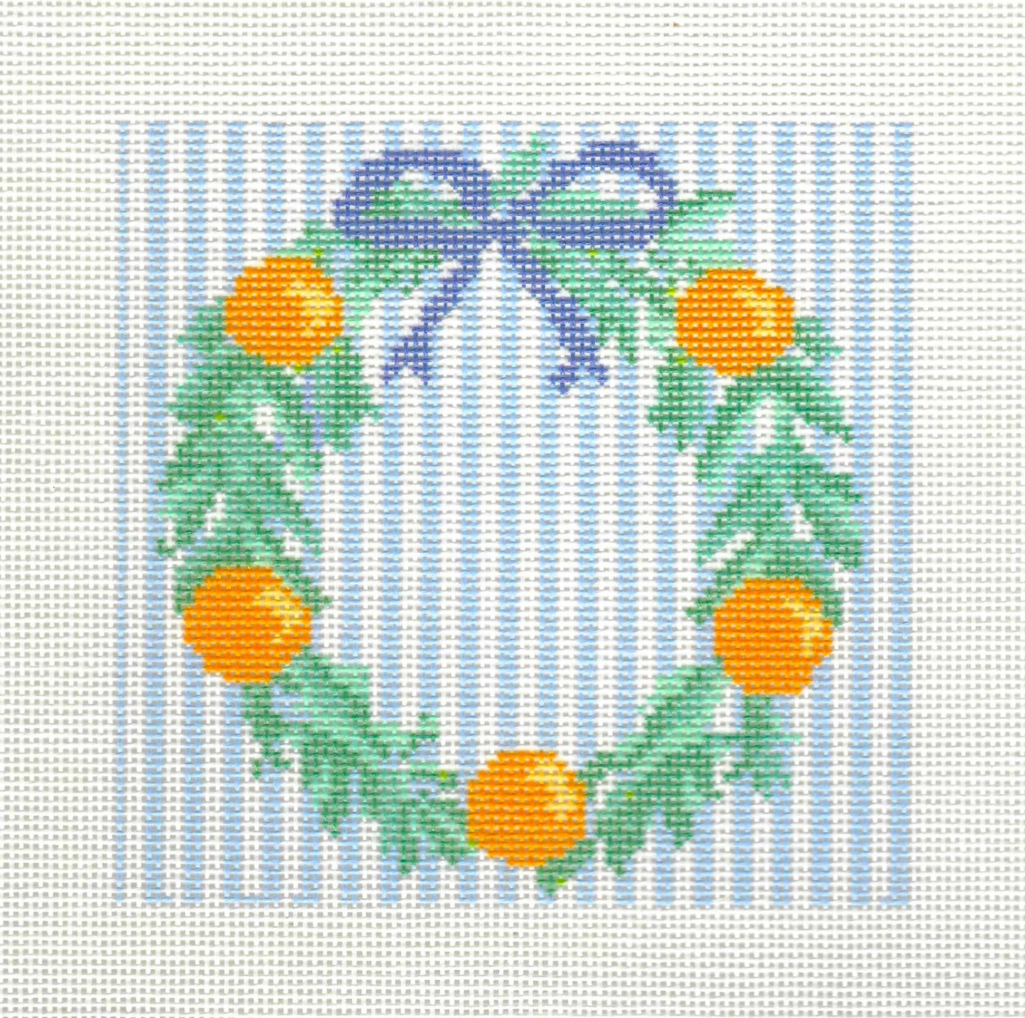 KCN Designers needlepoint canvas of green wreath with oranges on a blue and white striped background