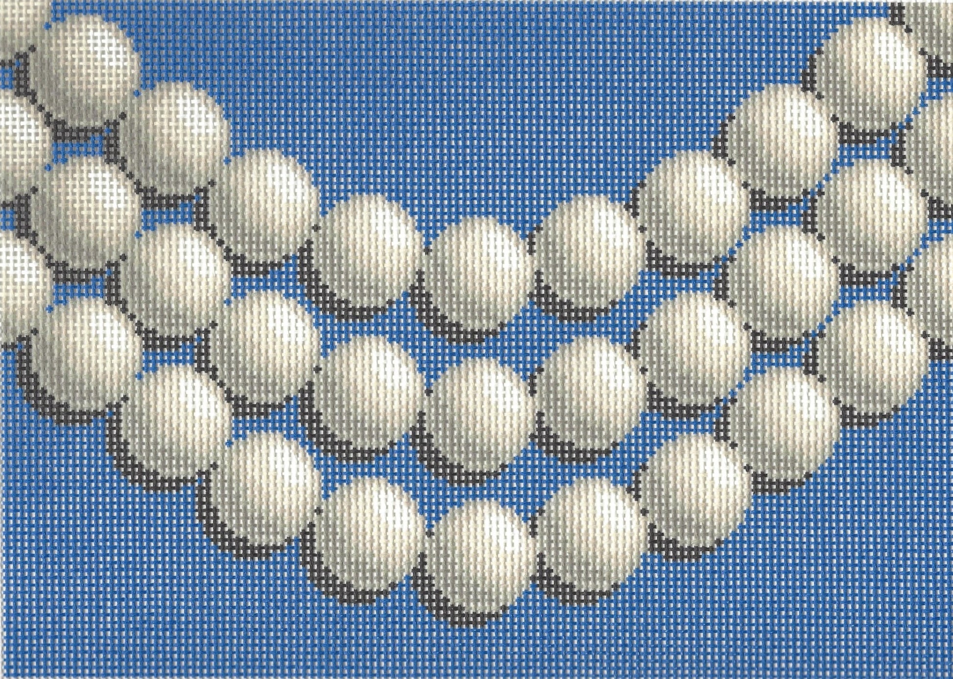 Jeni Sandberg needlepoint canvas of clutch with pearls and blue background