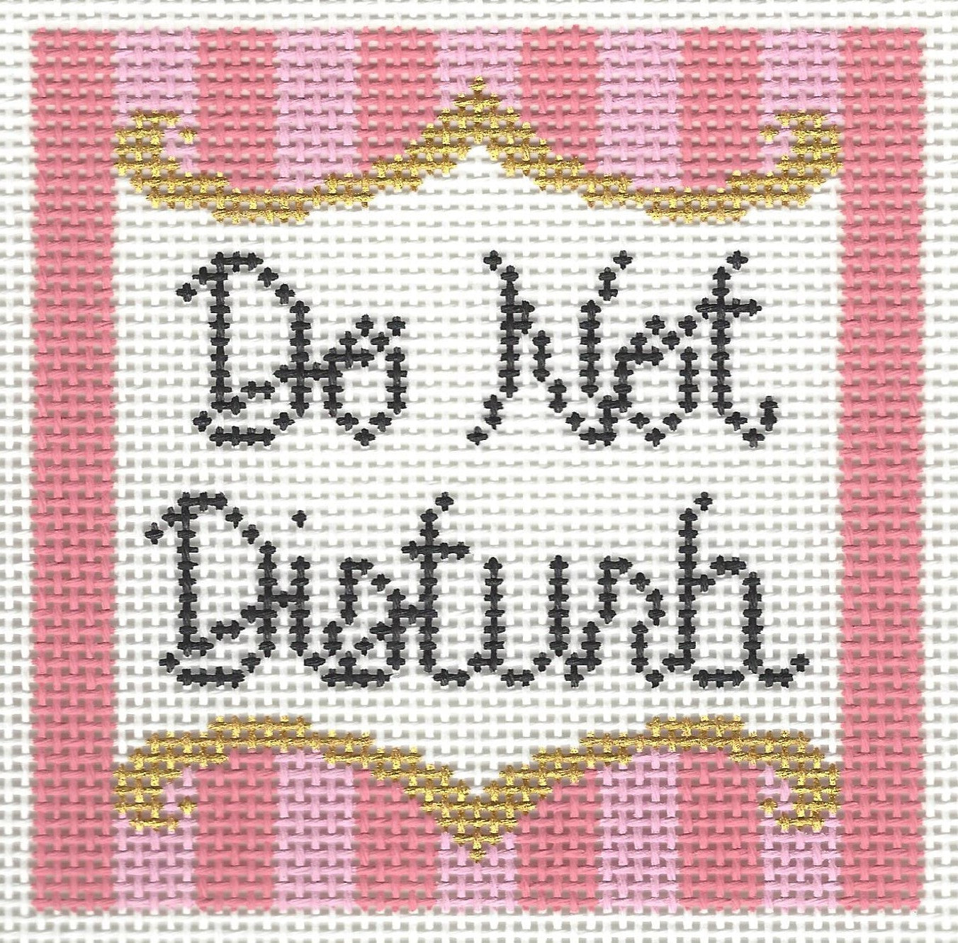 Morgan Julia needlepoint canvas of text 'Do Not Disturb' on a white background and a light and dark pink striped border
