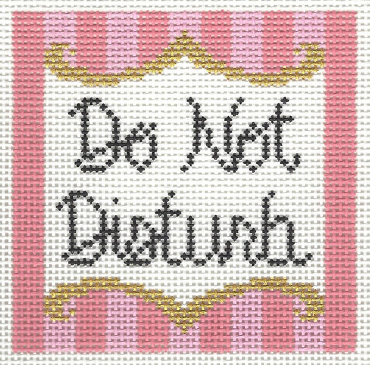 Morgan Julia needlepoint canvas of text 'Do Not Disturb' on a white background and a light and dark pink striped border