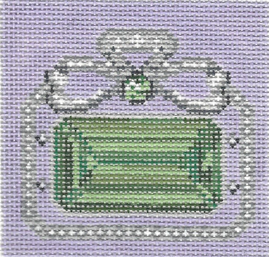 Rachel Barri Designs needlepoint canvas of an emerald gemstone with a light purple background