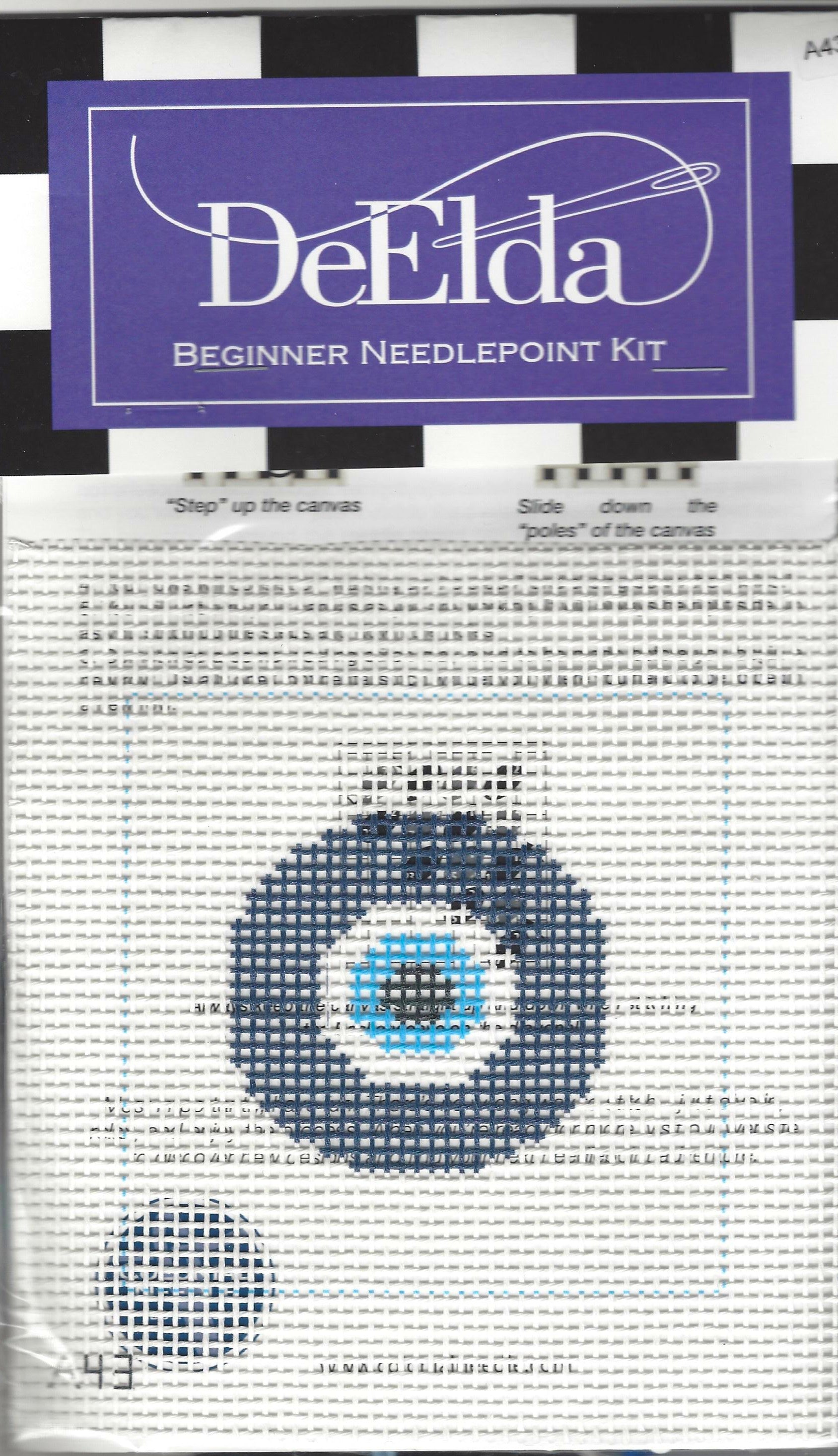 DeElda beginner needlepoint kit with an evil eye design