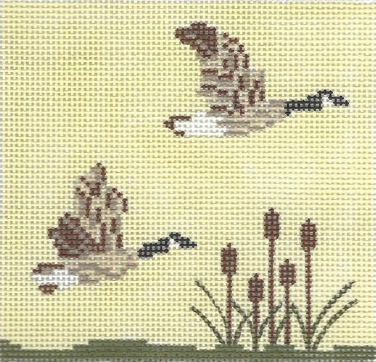 j. childs needlepoint canvas of two geese and plants on a light yellow background