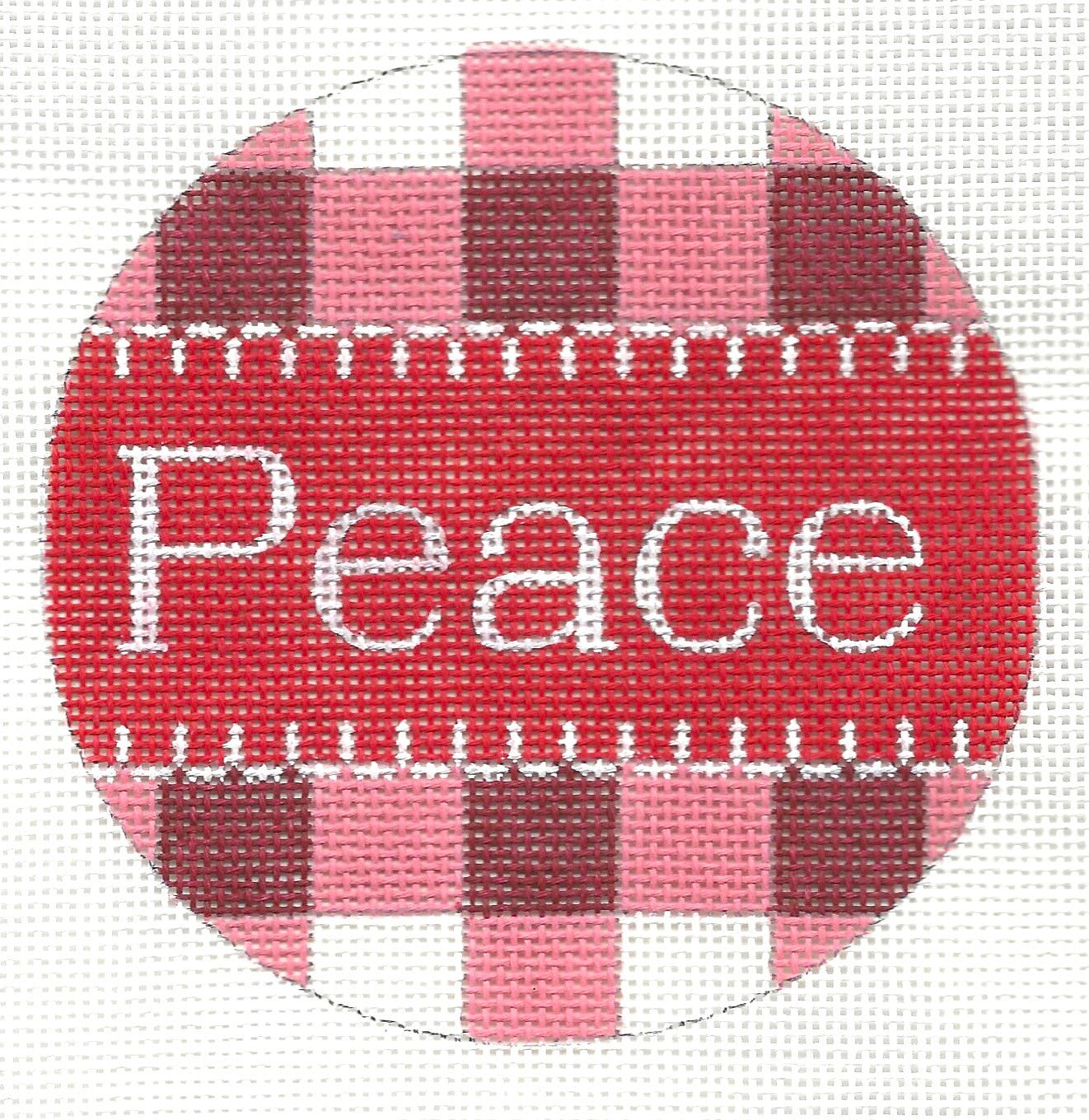 Alice Peterson Co. round ornament needlepoint canvas with red and pink checkered background with 'Peace' text in center