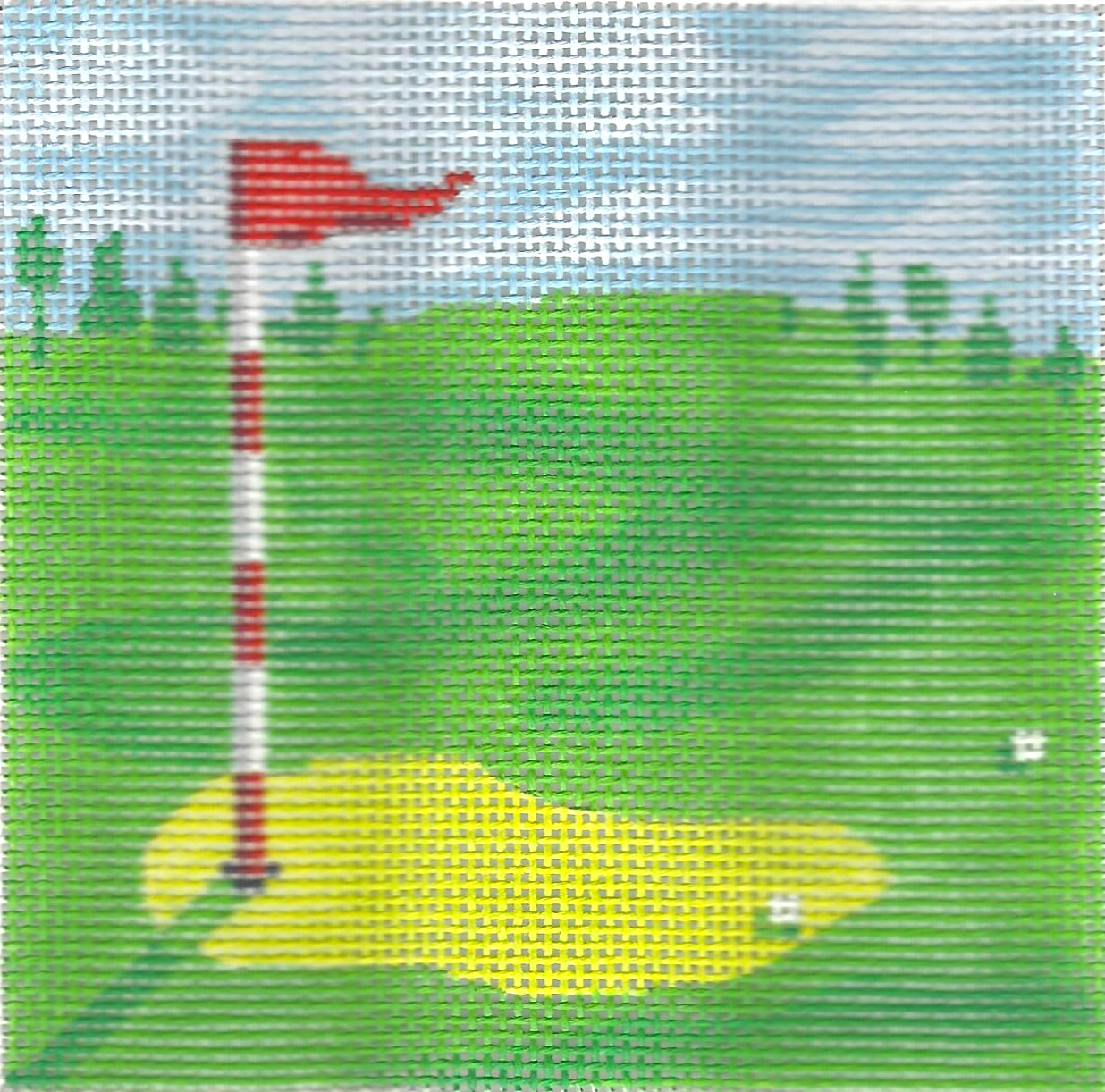 Kate Dickerson Needlepoint Collections needlepoint canvas of golf hole with two golf balls and red flag