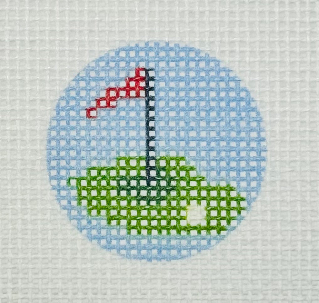 Tilli Tomas Planet Earth key fob insert needlepoint canvas of golf green with flag and golf ball on a blue background
