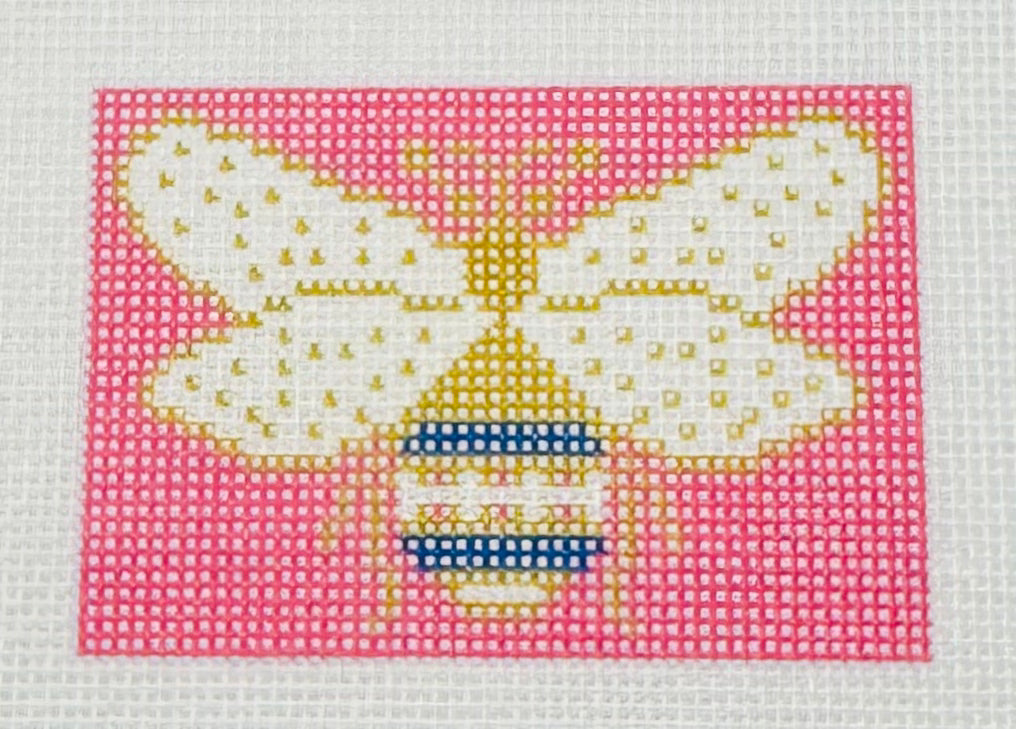 Tilli Tomas Planet Earth needlepoint canvas of a gold bumblebee with a pink background