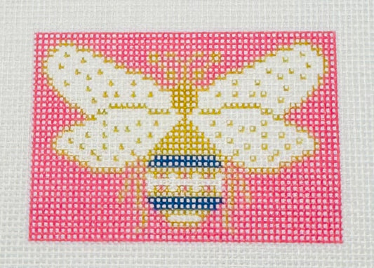 Tilli Tomas Planet Earth needlepoint canvas of a gold bumblebee with a pink background