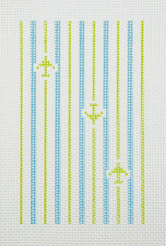 Tilli Tomas Planet Earth needlepoint canvas of design with aqua stripes and lime green stripes and airplanes