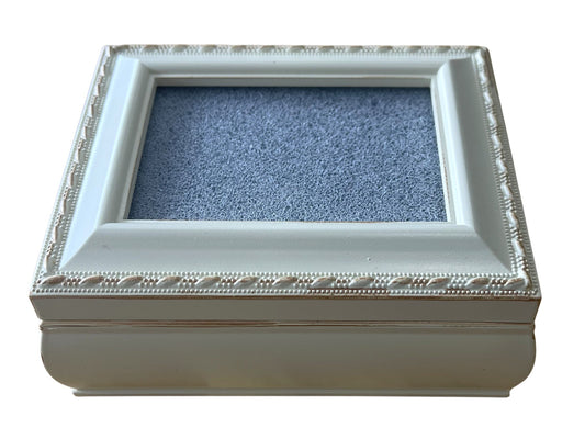 Rectangular ivory tresure box with glass area to showcase and protect canvas