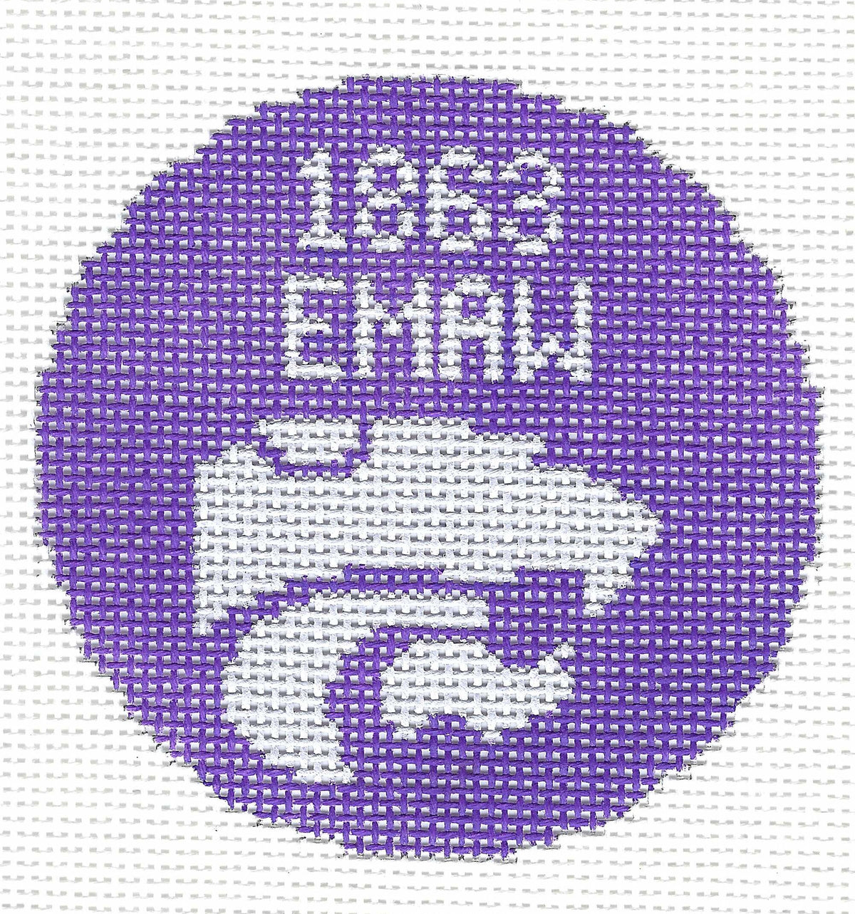Hedgehog Needlepoint circular needlepoint canvas featuring a purple background with white stitched text reading '1863 EMAW' and a white wildcat logo below.