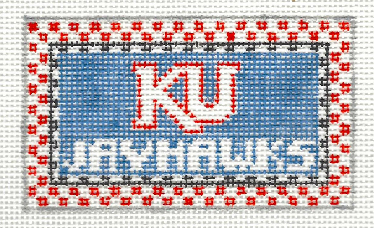Kathy Schenkel needlepoint canvas of 'KU Jayhawks' text on a blue background with red and white checkered border