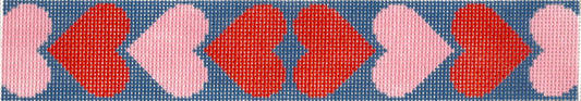 Jeni Sandberg key fob needlepoint canvas of red and light pink hearts with dark blue background