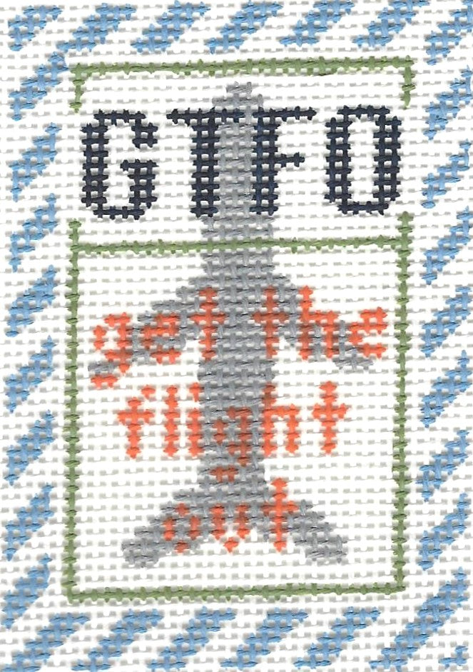 Rachel Barri Designs needlepoint canvas of luggage tag insert with an airplane and text 'GTFO, get the flight out' 