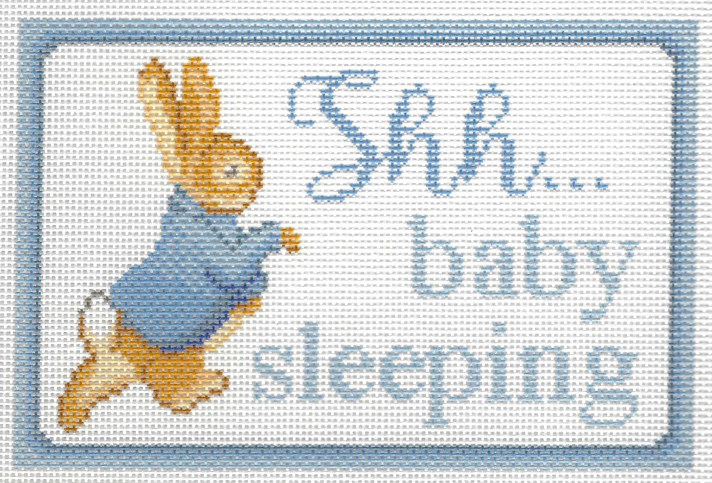 Needlepaint needlepoint canvas of Peter Rabbit with 'Shh... baby sleeping' text on a white background with light blue border